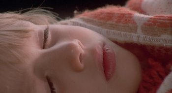 Movie still from “Rabid Dogs” (1974), directed by Mario Bava – The face of a young woman; Extreme Close Up shot, High angle