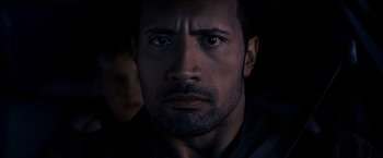 Movie still from “Race to Witch Mountain” (2009), directed by Andy Fickman – A person with a beard; Close Up shot, Over the shoulder angle