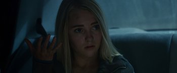 Movie still from “Race to Witch Mountain” (2009), directed by Andy Fickman – A young blonde haired woman sitting in a car; Close Up shot, Over the shoulder angle