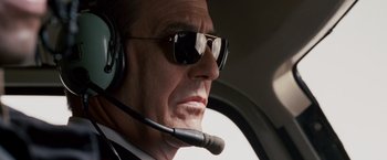 Movie still from “Race to Witch Mountain” (2009), directed by Andy Fickman – A person wearing headphones and sunglasses; Close Up shot, Low angle