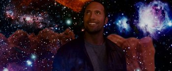 Movie still from “Race to Witch Mountain” (2009), directed by Andy Fickman – A person with a space background; Close Up shot, Overhead angle
