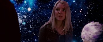 Movie still from “Race to Witch Mountain” (2009), directed by Andy Fickman – A woman standing in front of a star filled sky; Medium shot, Over the shoulder angle