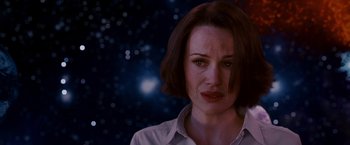 Movie still from “Race to Witch Mountain” (2009), directed by Andy Fickman – A person looking sad with stars in the background; Close Up shot, Over the shoulder angle