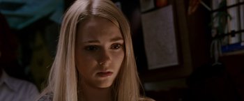 Movie still from “Race to Witch Mountain” (2009), directed by Andy Fickman – A woman with long blonde hair stares into the camera; Close Up shot, Low angle