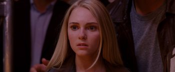 Movie still from “Race to Witch Mountain” (2009), directed by Andy Fickman – A person with long blonde hair; Close Up shot, Over the shoulder angle