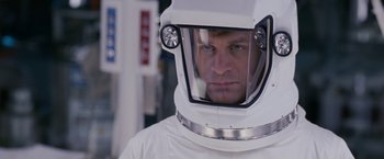Movie still from “Race to Witch Mountain” (2009), directed by Andy Fickman – A man in a spacesuit looking at the camera; Close Up shot, Over the shoulder angle