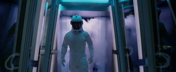 Movie still from “Race to Witch Mountain” (2009), directed by Andy Fickman – A man in a spacesuit walking through a tunnel; Medium shot, Low angle
