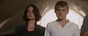 Movie still from “Race to Witch Mountain” (2009), directed by Andy Fickman – A woman and a man standing next to each other in a room; Close Up shot, Low angle