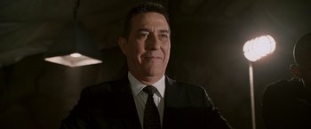 Movie still from “Race to Witch Mountain” (2009), directed by Andy Fickman – A person wearing a suit and tie; Close Up shot, Low angle