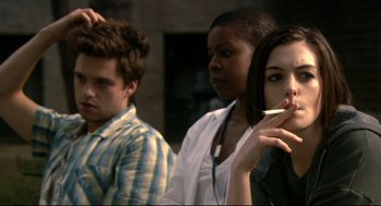 Movie still from “Rachel Getting Married” (2008), directed by Jonathan Demme – A group of people standing next to each other; Close Up shot, Over the shoulder angle