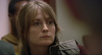 Movie still from “Rachel Getting Married” (2008), directed by Jonathan Demme – A person wearing a jacket; Close Up shot, Over the shoulder angle