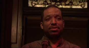 Movie still from “Rachel Getting Married” (2008), directed by Jonathan Demme – A person wearing a red tie; Close Up shot, Low angle