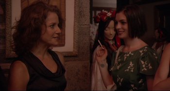 Movie still from “Rachel Getting Married” (2008), directed by Jonathan Demme – A group of women standing next to each other; Medium shot, Over the shoulder angle