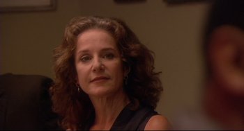 Movie still from “Rachel Getting Married” (2008), directed by Jonathan Demme – A person with curly hair; Close Up shot, Over the shoulder angle