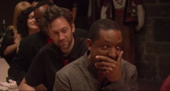 Movie still from “Rachel Getting Married” (2008), directed by Jonathan Demme – Two men sitting next to each other in a room; Close Up shot, Over the shoulder angle
