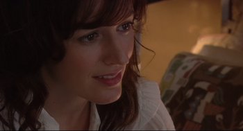Movie still from “Rachel Getting Married” (2008), directed by Jonathan Demme – A person wearing a white shirt; Close Up shot, Over the shoulder angle