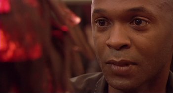 Movie still from “Rachel Getting Married” (2008), directed by Jonathan Demme – A man's face in front of a blurry background; Close Up shot, Over the shoulder angle