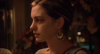 Movie still from “Rachel Getting Married” (2008), directed by Jonathan Demme – A person wearing a pair of earrings; Close Up shot, Over the shoulder angle