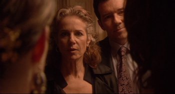 Movie still from “Rachel Getting Married” (2008), directed by Jonathan Demme – A man and a woman looking in a mirror; Close Up shot, Over the shoulder angle