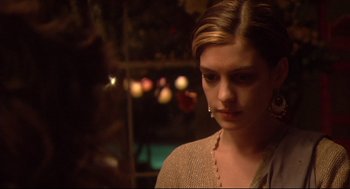 Movie still from “Rachel Getting Married” (2008), directed by Jonathan Demme – A young woman is looking down at her face; Close Up shot, Over the shoulder angle