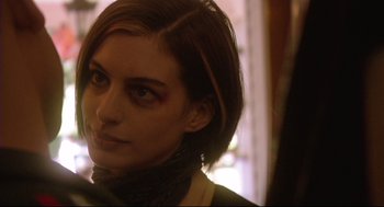 Movie still from “Rachel Getting Married” (2008), directed by Jonathan Demme – A person wearing makeup on their face; Close Up shot, Over the shoulder angle