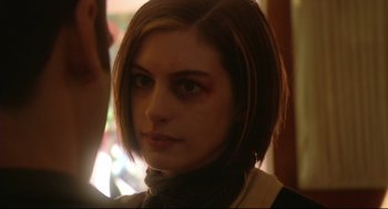 Movie still from “Rachel Getting Married” (2008), directed by Jonathan Demme – A person with short brown hair; Close Up shot, Over the shoulder angle