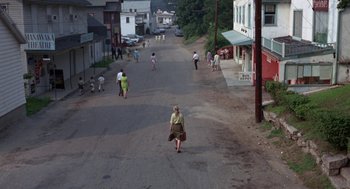 Movie still from “Rachel, Rachel” (1968), directed by Paul Newman – People walking down a street in a small town; Extreme Wide shot, High angle
