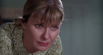 Movie still from “Rachel, Rachel” (1968), directed by Paul Newman – A person wearing a shirt; Close Up shot, Over the shoulder angle