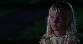 Movie still from “Rachel, Rachel” (1968), directed by Paul Newman – A little girl with long blonde hair and blue eyes looking at the camera; Close Up shot, High angle