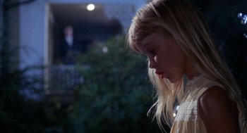 Movie still from “Rachel, Rachel” (1968), directed by Paul Newman – A young blonde haired girl is looking down at her face; Close Up shot, Over the shoulder angle