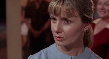 Movie still from “Rachel, Rachel” (1968), directed by Paul Newman – A person wearing a blue shirt; Close Up shot, Over the shoulder angle