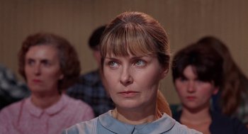 Movie still from “Rachel, Rachel” (1968), directed by Paul Newman – A person looking at the camera; Close Up shot, Over the shoulder angle