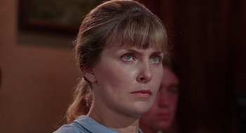 Movie still from “Rachel, Rachel” (1968), directed by Paul Newman – A person with blue eyes; Close Up shot, Low angle