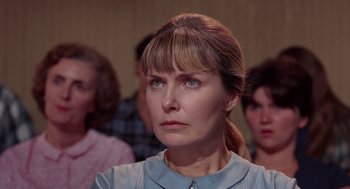 Movie still from “Rachel, Rachel” (1968), directed by Paul Newman – A person looking at the camera; Close Up shot, Over the shoulder angle