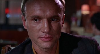 Movie still from “Rachel, Rachel” (1968), directed by Paul Newman – A man's face in a suit and tie; Close Up shot, Over the shoulder angle