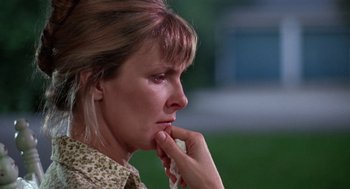 Movie still from “Rachel, Rachel” (1968), directed by Paul Newman – A person with her hand to her face; Close Up shot, Low angle