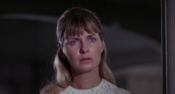 Movie still from “Rachel, Rachel” (1968), directed by Paul Newman – A person with long blonde hair; Close Up shot, Low angle