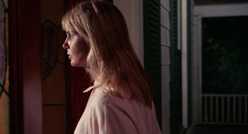 Movie still from “Rachel, Rachel” (1968), directed by Paul Newman – A woman with long blonde hair wearing a pink shirt; Close Up shot, Low angle