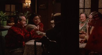 A group of people sitting around a table