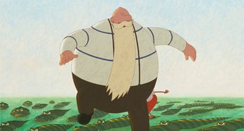 Movie still from “Raining Cats and Frogs” (2003), directed by Jacques-Rémy Girerd – An old man with a long white beard is standing in a field; Medium shot, Low angle