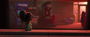 Movie still from “Ralph Breaks the Internet” (2018), directed by Rich Moore – A little girl sitting on a ledge looking out of a window; Wide shot, Over the shoulder angle