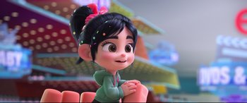 Movie still from “Ralph Breaks the Internet” (2018), directed by Rich Moore – A cartoon girl with a bow on her head; Close Up shot, Over the shoulder angle