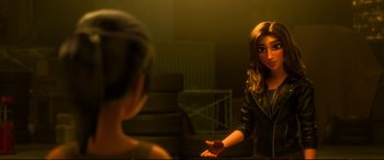 Movie still from “Ralph Breaks the Internet” (2018), directed by Rich Moore – A woman in a black leather jacket talking to another woman in front of a mirror; Close Up shot, Over the shoulder angle