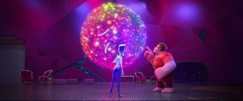 Movie still from “Ralph Breaks the Internet” (2018), directed by Rich Moore – A woman standing in front of a giant ball of light; Extreme Wide shot, Over the shoulder angle