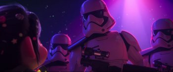 Movie still from “Ralph Breaks the Internet” (2018), directed by Rich Moore – A couple of people that are holding a gun; Medium shot, Low angle