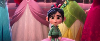 Movie still from “Ralph Breaks the Internet” (2018), directed by Rich Moore – A cartoon character is standing in front of a pink background; Close Up shot, Over the shoulder angle