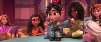 Movie still from “Ralph Breaks the Internet” (2018), directed by Rich Moore – A little girl sitting next to two other little girls; Medium shot, Over the shoulder angle