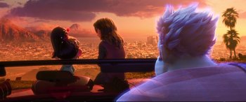 Movie still from “Ralph Breaks the Internet” (2018), directed by Rich Moore – A woman sitting in a car looking out over a city; Medium shot, Over the shoulder angle