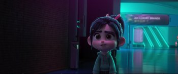 Movie still from “Ralph Breaks the Internet” (2018), directed by Rich Moore – A girl is standing in a purple room; Close Up shot, Over the shoulder angle