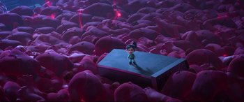 Movie still from “Ralph Breaks the Internet” (2018), directed by Rich Moore – A small toy figure standing on top of a box; Extreme Wide shot, High angle